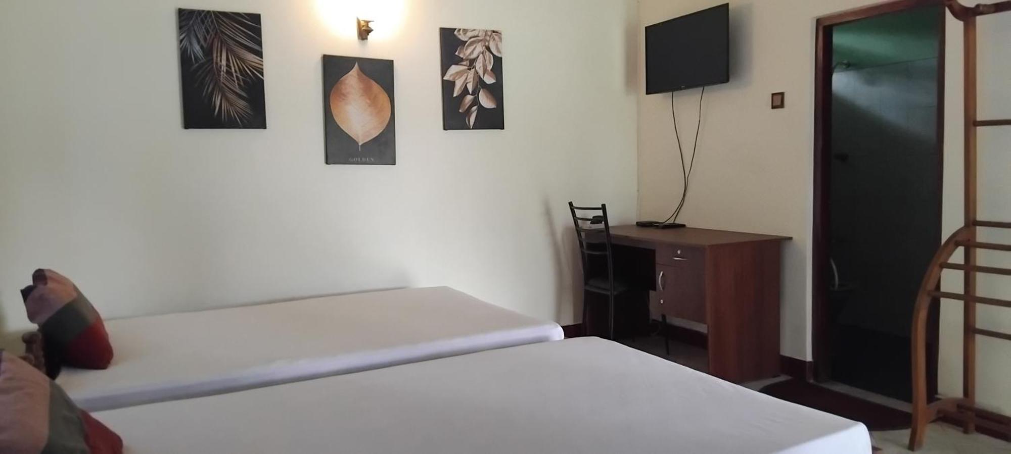 Hansika Guest Inn Buttala Habitación foto
